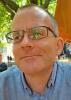 Dr Justin  Meggitt