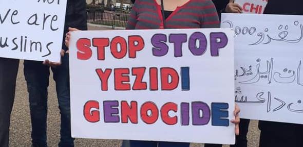 Title: Yazidi demonstration in front of the White House in Washington DC. Creator: Êzîdîxan. Source: https://tinyurl.com/y7c6ktpe. Licence: CC BY-SA 4.0